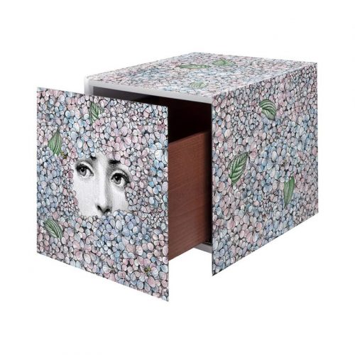cube with drawer made of wood and painted in the shape of a human face surrounded by flowers