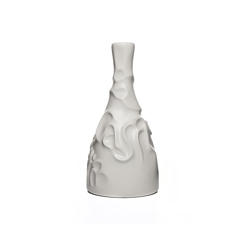 small white ceramic sculpture in the shape of a vase and imperfect finishes