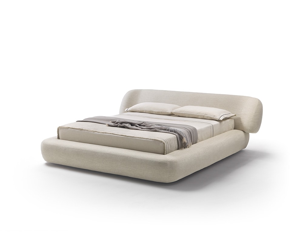 bed made of wood, polyurethane foam and removable leather in different light tones