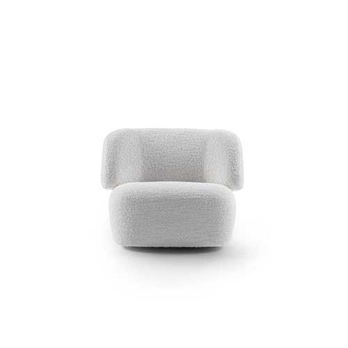 Armchair made of polyurethane foam, wood and white metal base in a white background