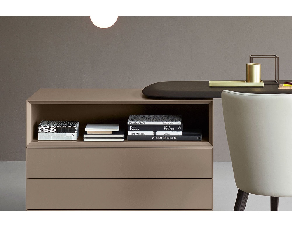 able made of beige wood with snap-on drawers and a shelf