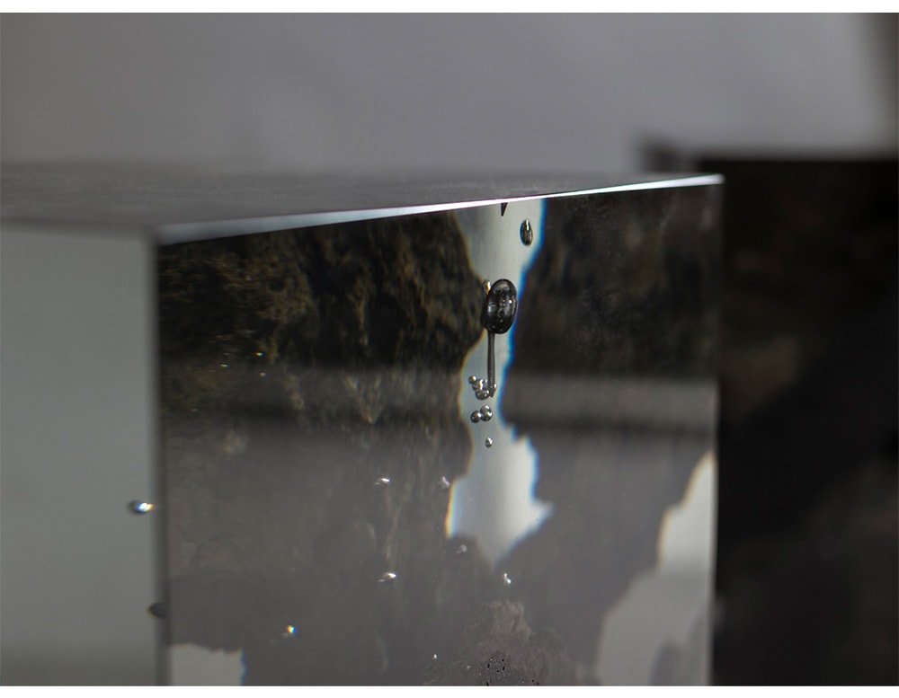 stool made with natural lava stone and resin preserving its color and energy