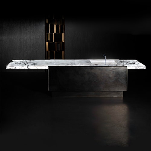 kitchen table made of stone and metal with a white finish on a black background