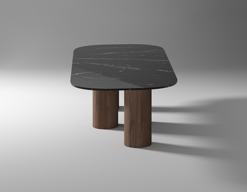 Dining table made with brown wooden base and black marble top with white finishes
