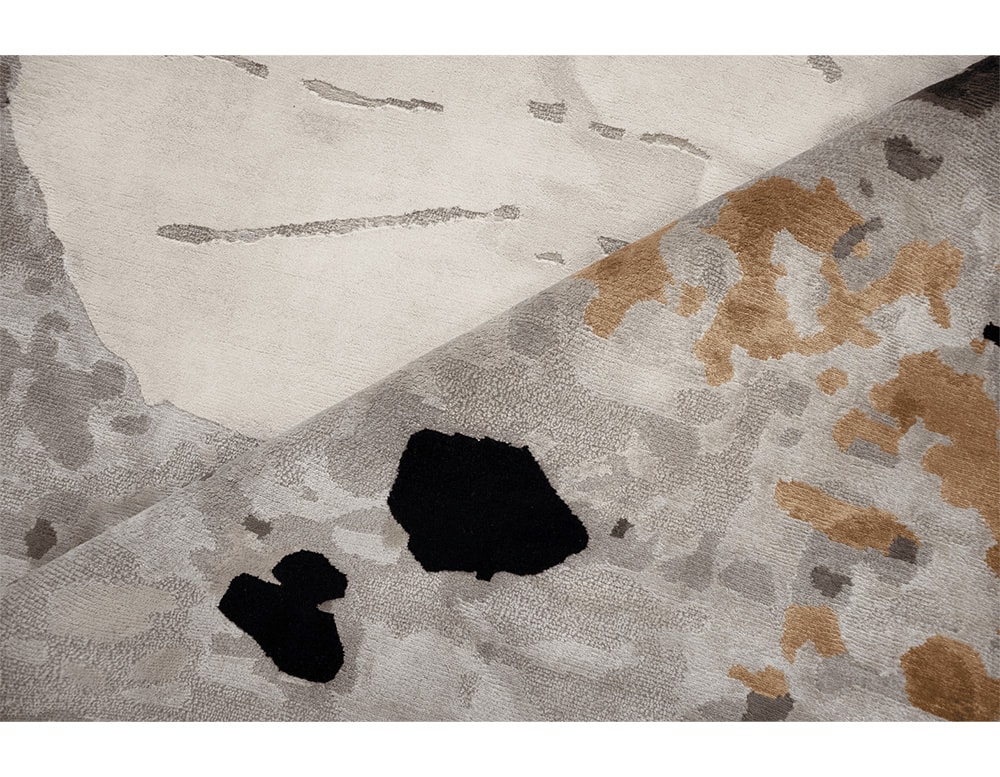 carpet made from silk and hand-knotted with finishes simulating a map of countries