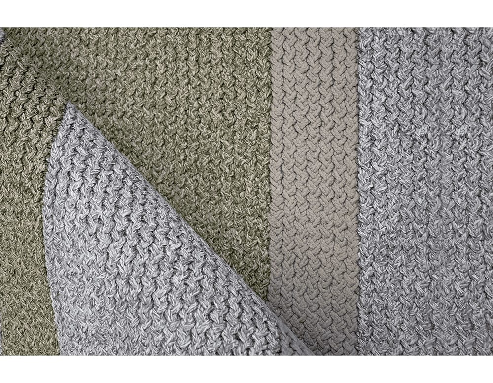 rug with interwoven design of beige, green and gray lines