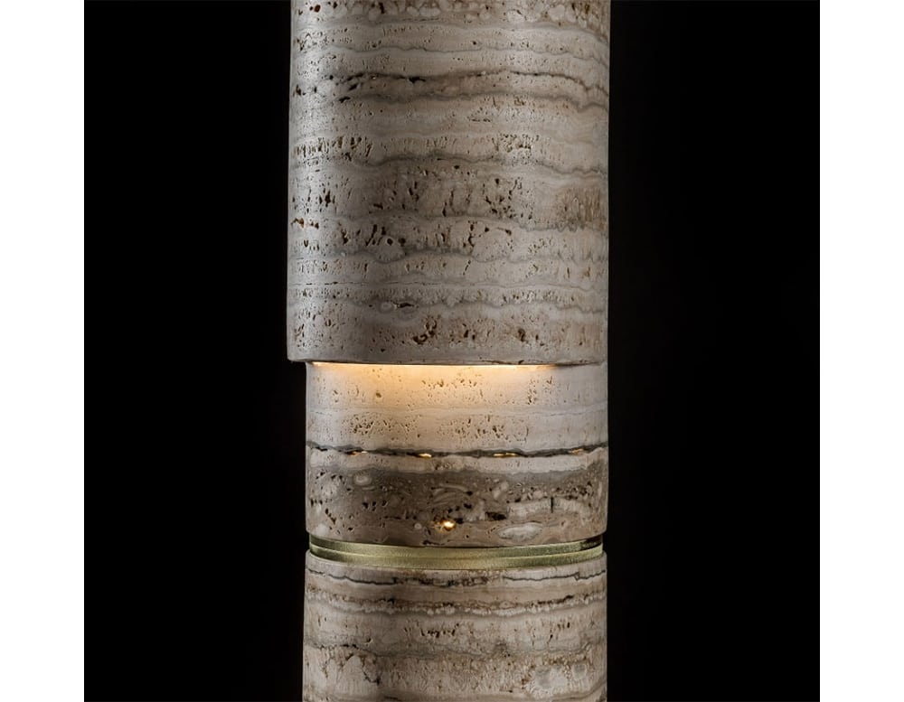 floor lamp made of brass and stone, one tone in natural stone color in black background