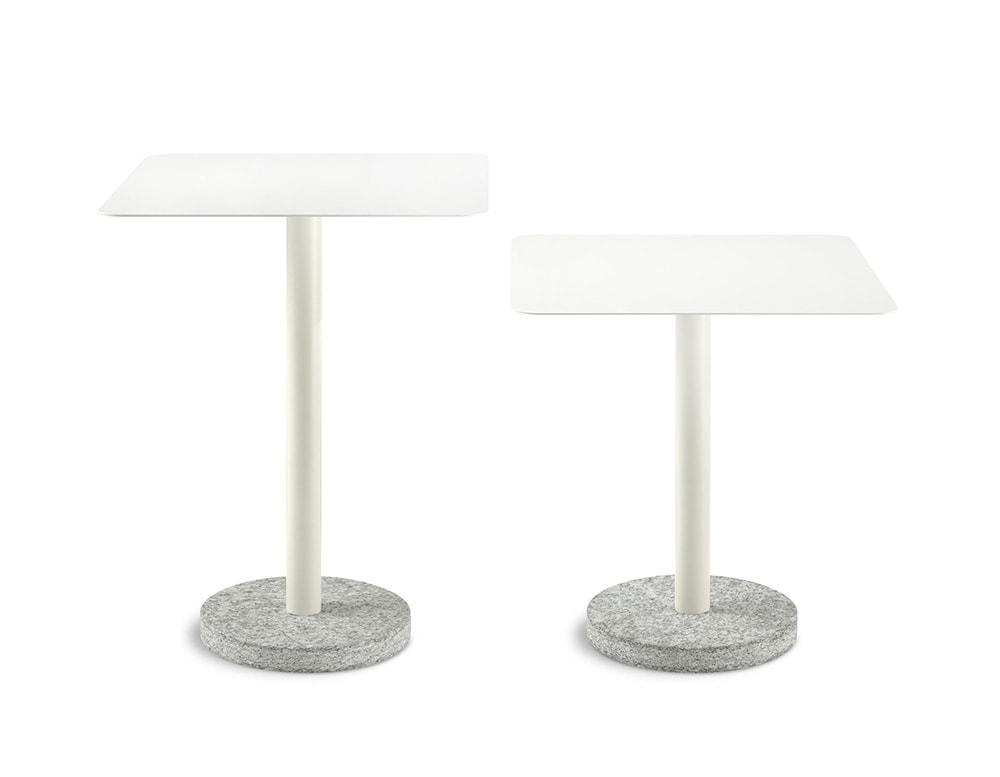 side tables made of stone and tubular metal base in a white background