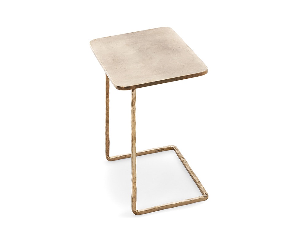 side table made of aluminum and bronze with gold tones on white background