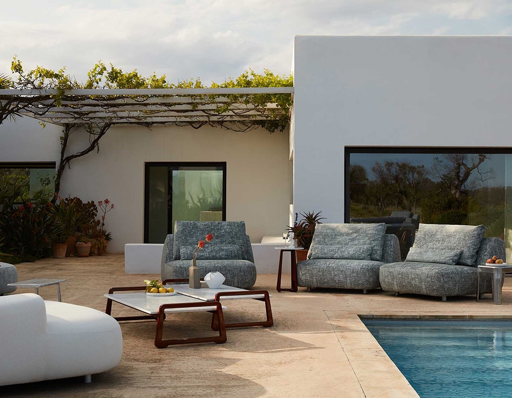 outdoor armchairs made with foam and gray and white fabric