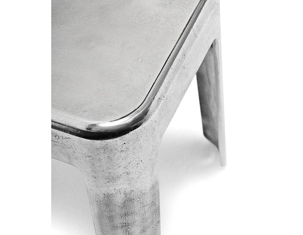 table made of aluminum and silver bronze on a white background.
