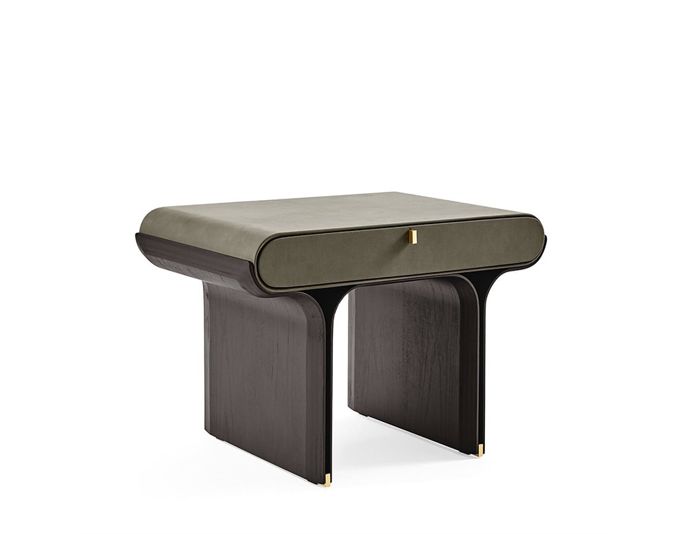 Dark green nightstand with drawer with curved base and dark brown wooden legs.