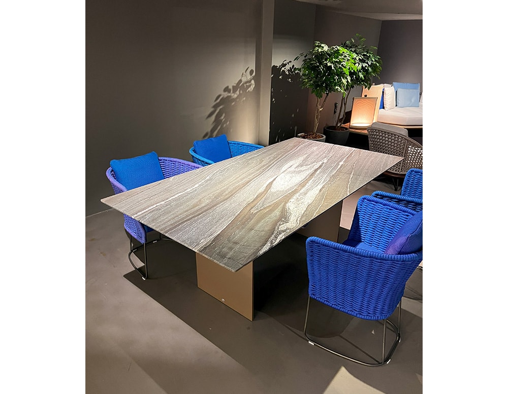 dining table made of natural stone with a rectangular top with a clear brown color winter wood leather