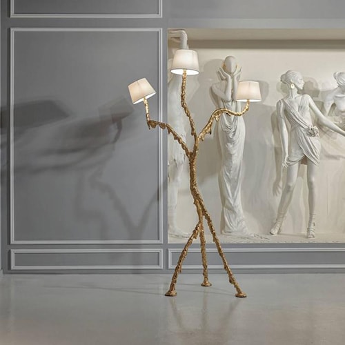 3-part floor lamp made of steel and ballad with gold paint