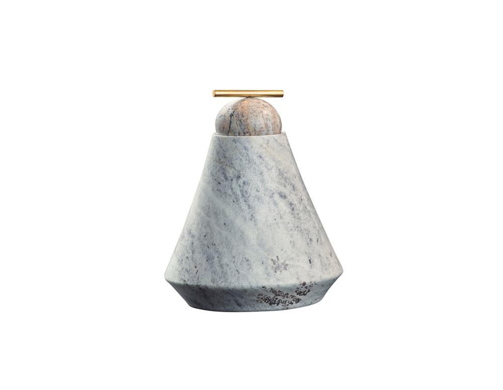 soapstone sculpture with lñaton finish and a pyramid shape.