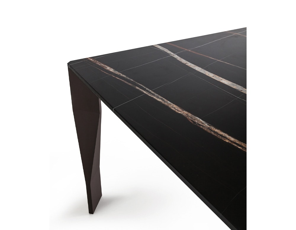 dining table made of aluminum and polyurethane with finishes in the shape of Sahara Noir Stone
