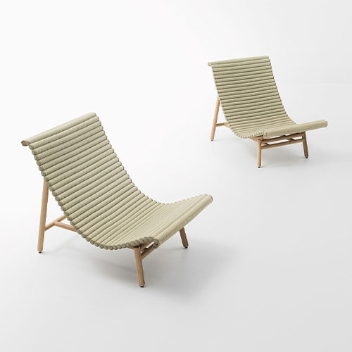 Two beige tatami lounge chairs, with wooden legs