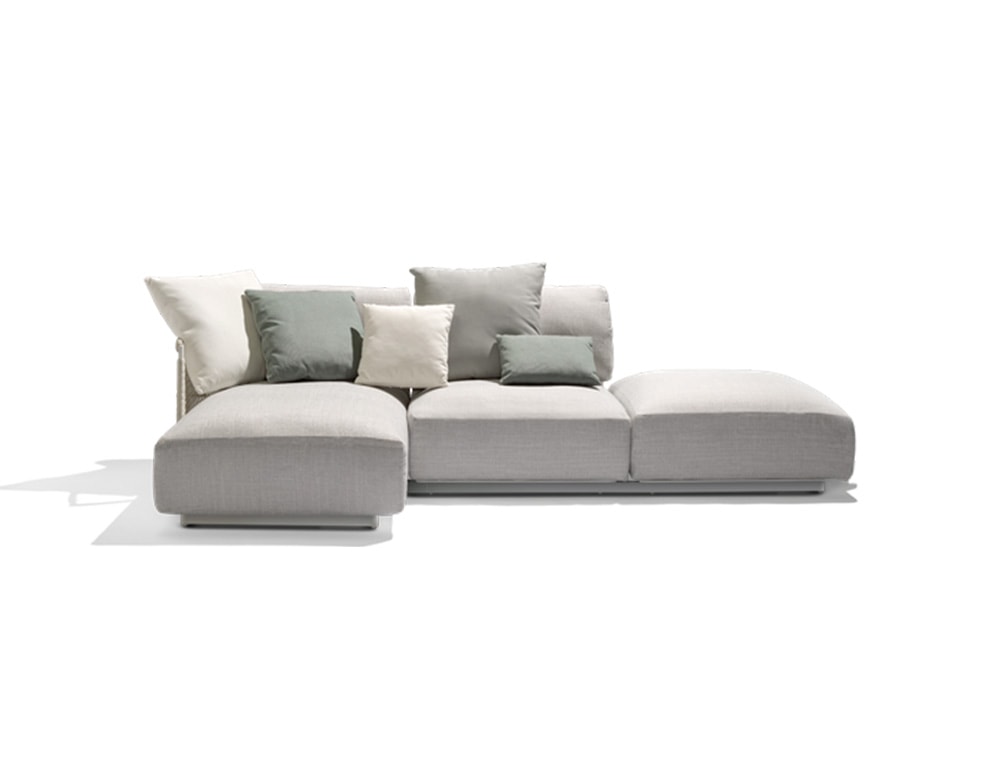 Sofa made with a steel base and upholstered in white and gray fabric with cushions of various sizes