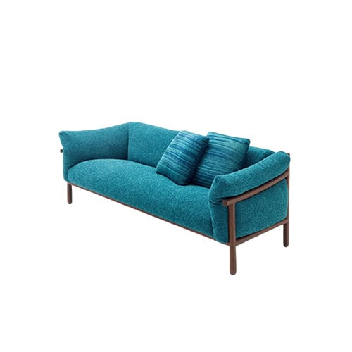 A sleek upholstered sofa in vibrant teal, featuring a solid wooden frame and accent pillows, blending comfort with a contemporary aesthetic.