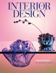 A magazine cover featuring a modern interior design aesthetic with a striking composition of sculptural decor pieces in shades of blue and purple, set against a soft pink gradient background