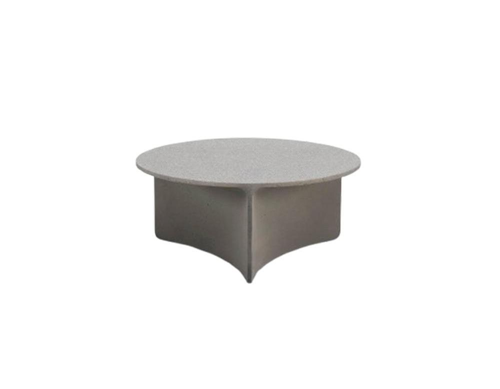 A round light grey coffee table with a sculpted dark grey base divided into three curved segments.