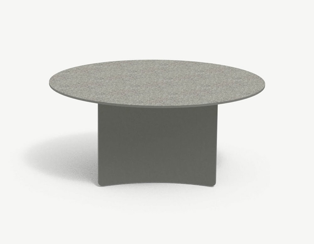 A large round coffee table featuring a speckled light grey top and a solid dark grey base with a concave front face.