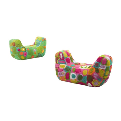 Vibrant and sculptural outdoor sofa featuring dynamic shapes and multi-color upholstery for a unique and artistic seating experience.