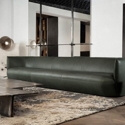 Hen Pneuma Sofa showcases elegant geometry with generous proportions and premium leather. Its deep seat and clean lines evoke quiet luxury, perfectly suited for sophisticated, modern interiors.