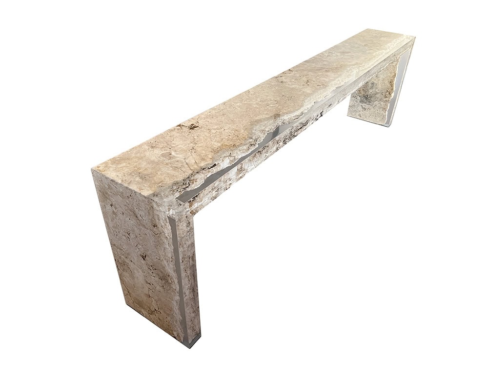 Natural Rapolano stone console with resin inserts that highlight the raw edges creating a unique balance between nature and craftsmanship.