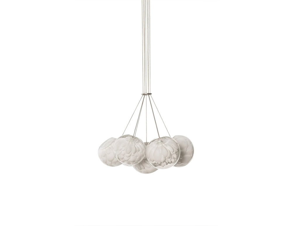 The Boc 118 Series compact chandelier features a cluster of five hand-blown glass spheres, suspended in perfect balance to create a soft and sculptural lighting piece.