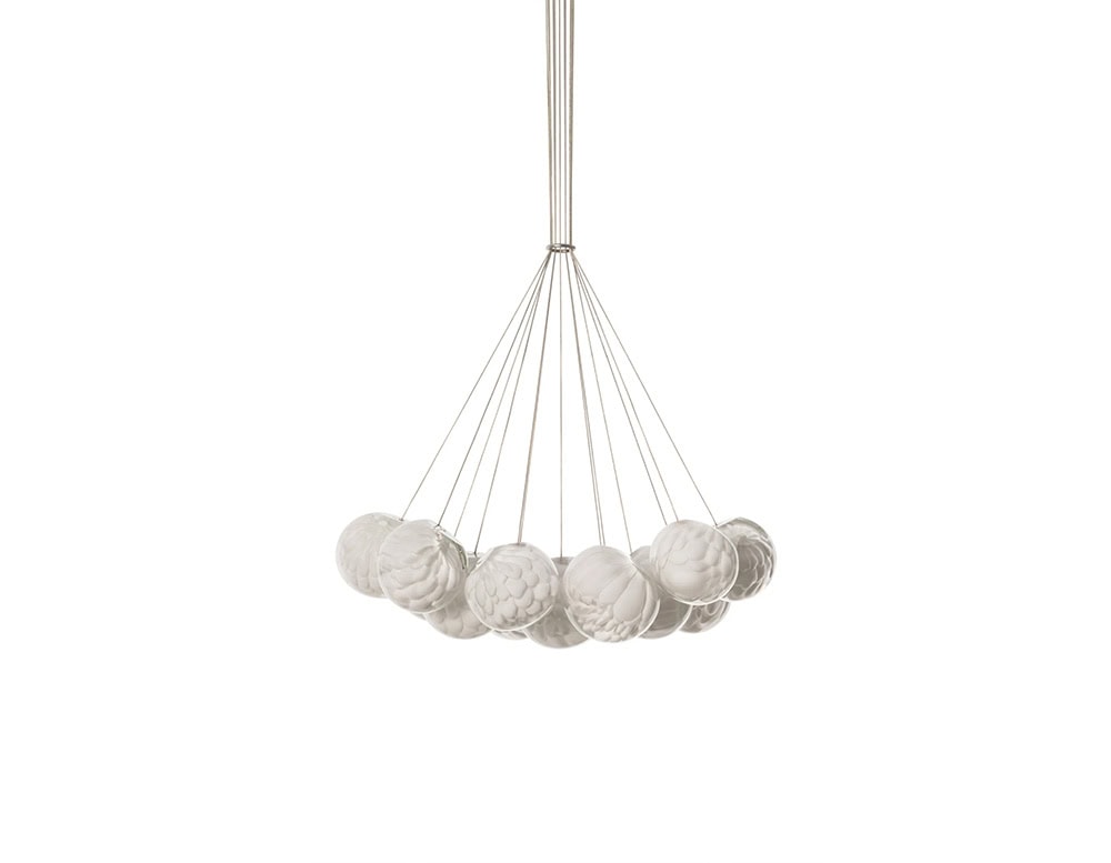 The Boc 118 Series chandelier creates a dramatic statement with a cluster of hand-blown glass spheres, each suspended by fine cables to form a floating circle of sculptural light.