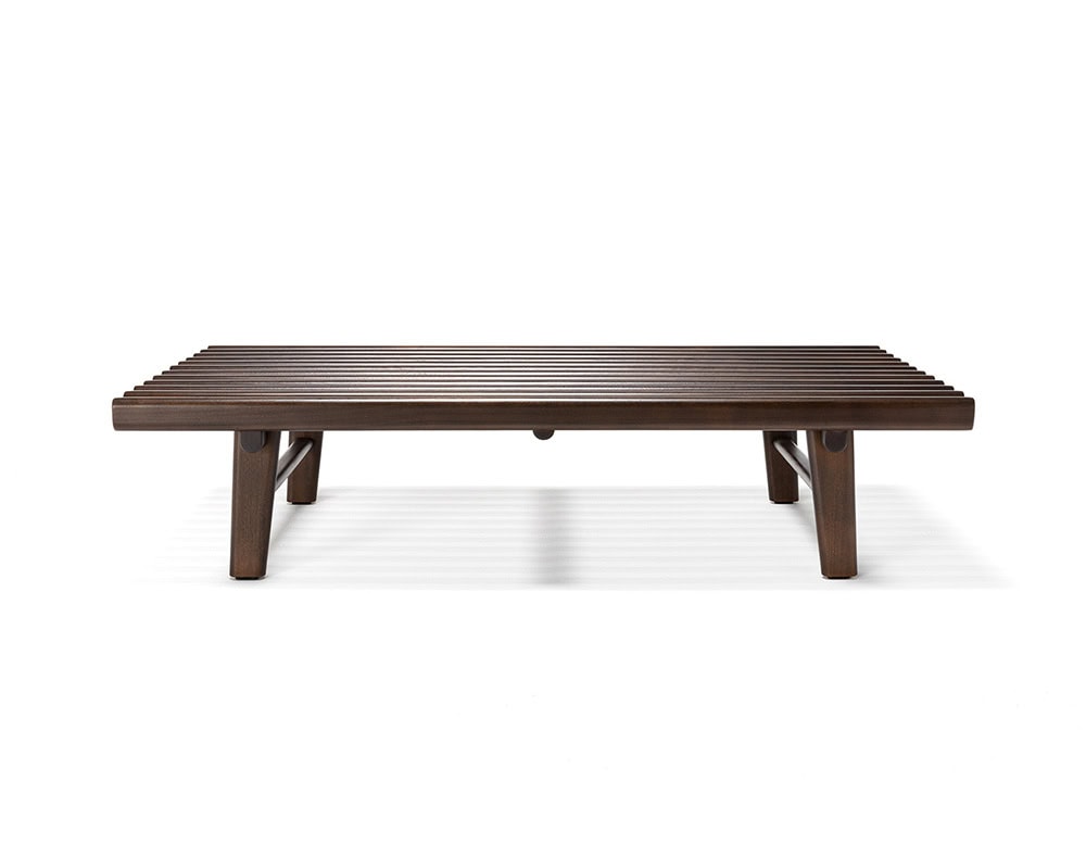 The Ext Elba Coffee Table Outdoor showcases a slatted wood top with clean proportions and a grounded silhouette, designed to complement contemporary outdoor lounging with understated elegance.