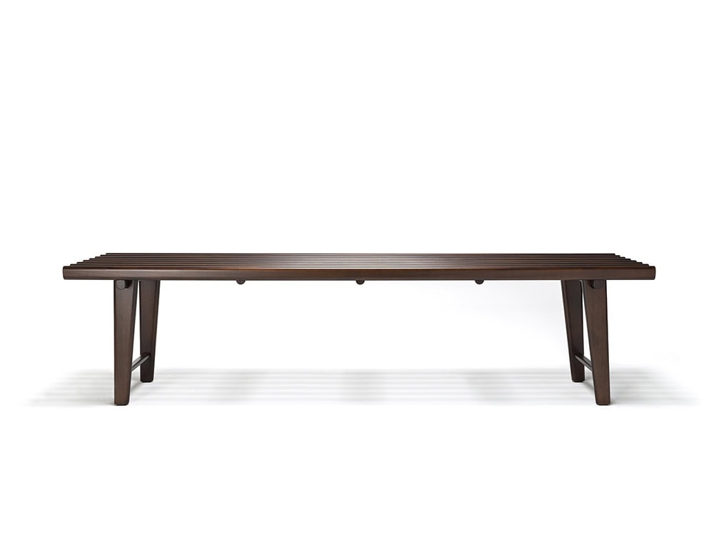 The Ext Elba Coffee Table Outdoor presents a long, slatted wood surface with a minimalist frame, designed to offer durability and effortless style for open-air gatherings.