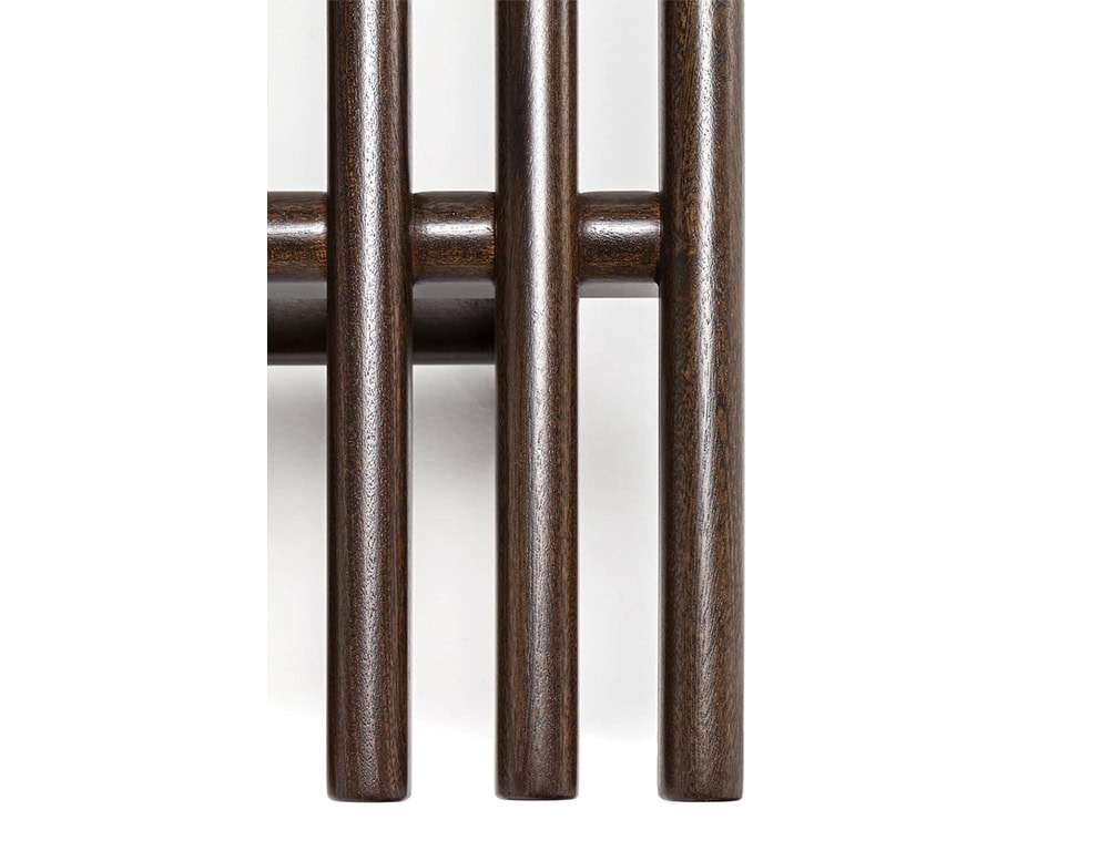 The Ext Elba Coffee Table Outdoor showcases precise joinery with rounded wood slats and cross-supports, emphasizing craftsmanship and durability in a sleek outdoor design.