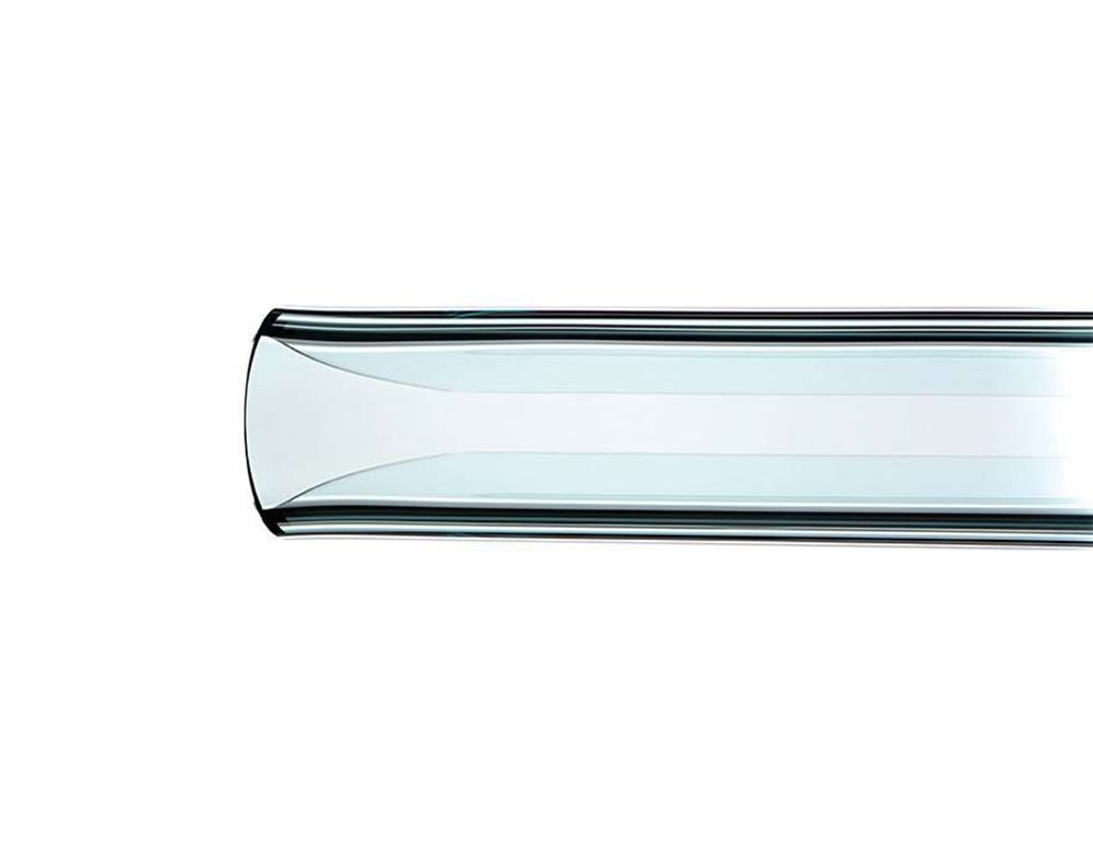 The Fiam Let Me See Mirror shelf features a fluid, curved glass design that captures light and detail, offering a refined blend of function and sculptural beauty.