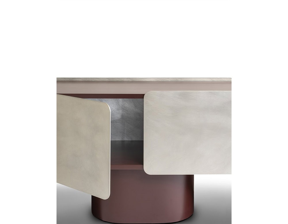 The GR Admira Cabinet shown with doors open, revealing interior shelving. The exterior features brushed silver panels paired with a soft burgundy structure.