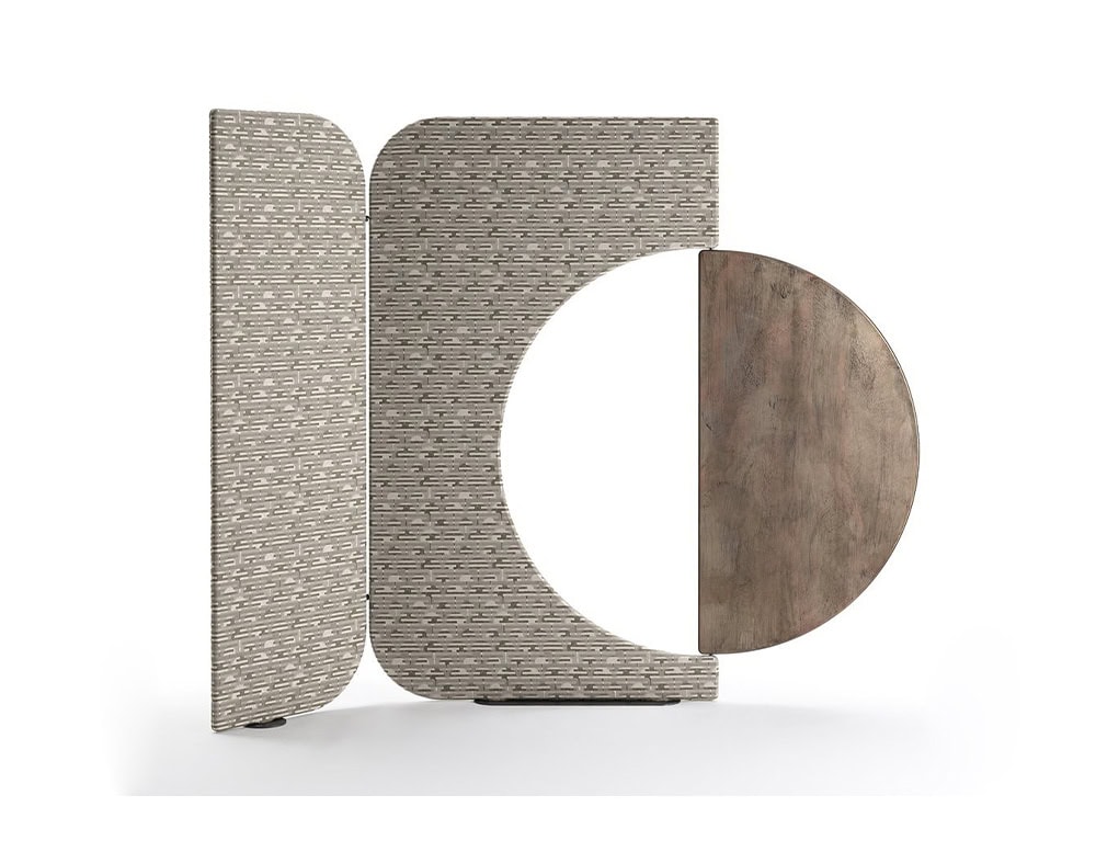 The Enso Screen features softly patterned panels in neutral tones, paired with a circular wood accent in muted brown. Its clean geometric design adds balance to contemporary interiors.