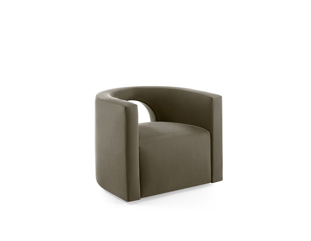 The GR H2O Lounge Chair features sculptural geometry with a softly rounded back and a distinctive cut-out detail. Its muted taupe-brown upholstery gives it a subtle, refined look.