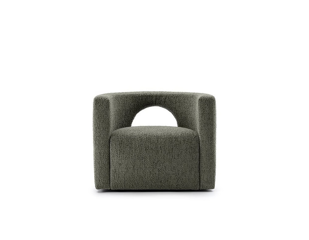 The GR H2O Lounge Chair features a plush, textured upholstery and sculptural cut-out back detail. Its soft tone enhances the chair’s inviting and architectural form.