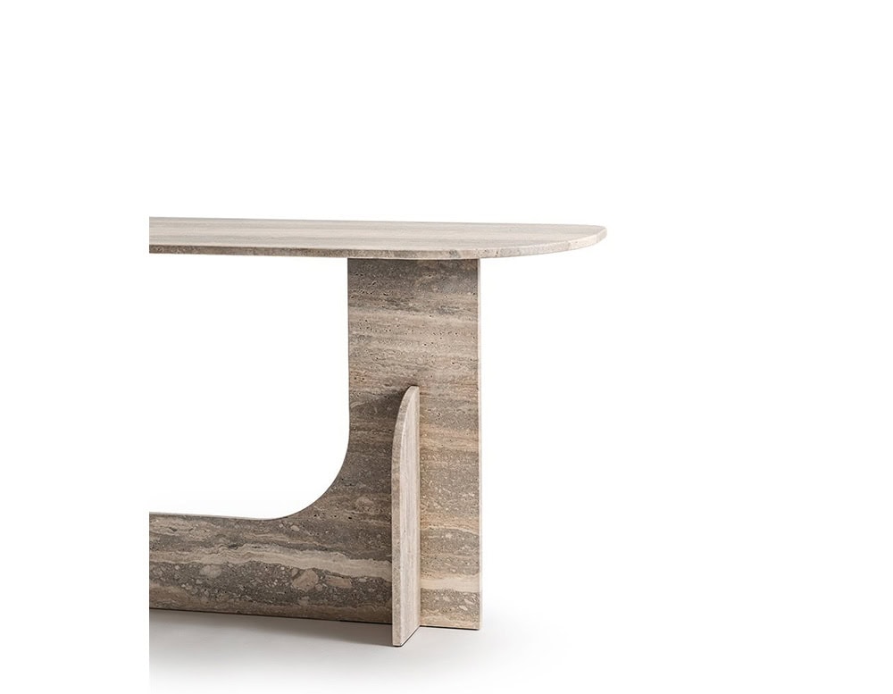 The GR Selce Console Table showcases a softly curved travertine surface in layered beige and taupe tones. Its sculptural base creates a refined silhouette with a natural stone texture.