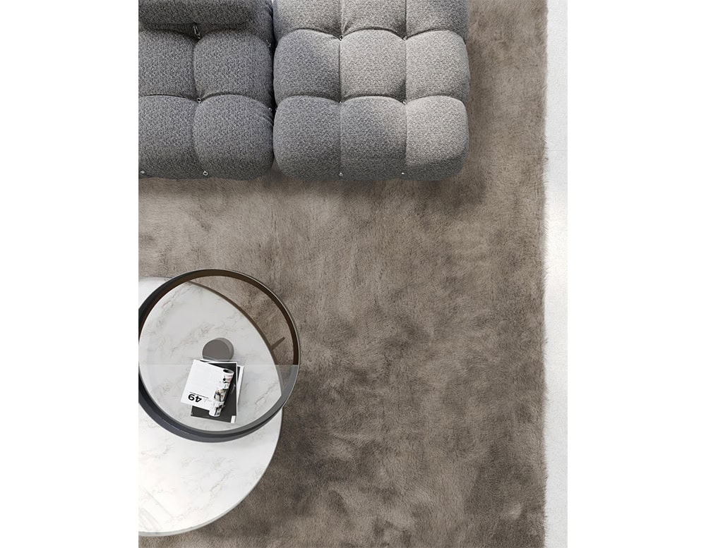 The Kymo Urban Soul Rug enriches contemporary interiors with a velvety finish and tonal depth, creating a cozy yet refined foundation for modern living spaces.