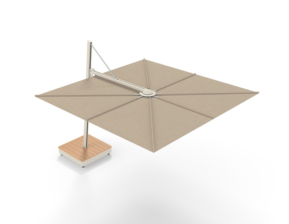 Versa UX Umbrella in a light taupe canopy with a soft cream frame and natural wood base. Its square shape and gentle palette create a refined, coastal feel suited for serene terraces or beachside lounges.