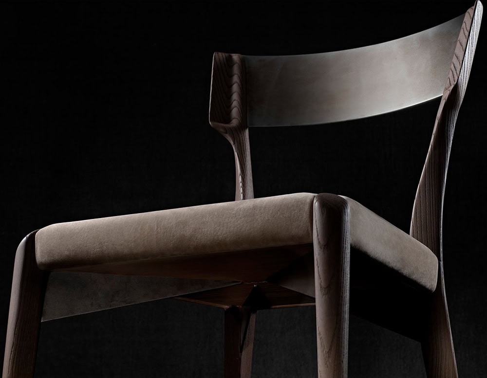 The Hen Chair VA features a gracefully curved backrest and finely crafted legs. Its rich wood grain and soft upholstered seat bring warmth and elegance to any setting.