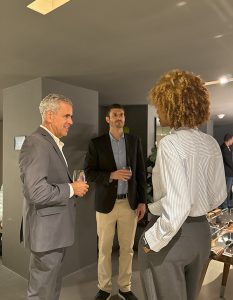 Guests connect and exchange ideas in a calm, welcoming setting.