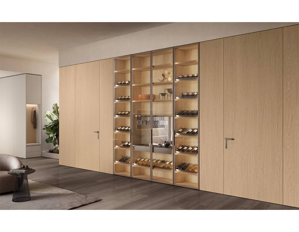 Designed with refined wood finishes and full-height glass doors, this wall unit elegantly showcases wine collections while maintaining a minimalist aesthetic.