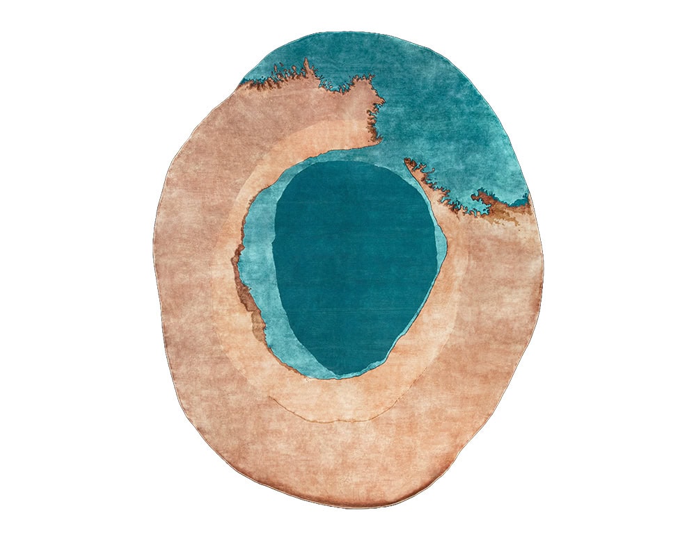 The Sah Bonsai Rug evokes organic harmony with flowing contours in earthy beige and deep turquoise. Its bold design brings a natural focal point to contemporary interiors.