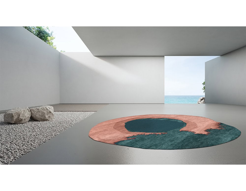 The Sah Bonsai Rug combines rich teal with warm earthy tones, evoking natural landscapes. Its fluid pattern creates a striking focal point, bringing harmony and elegance to modern interiors.