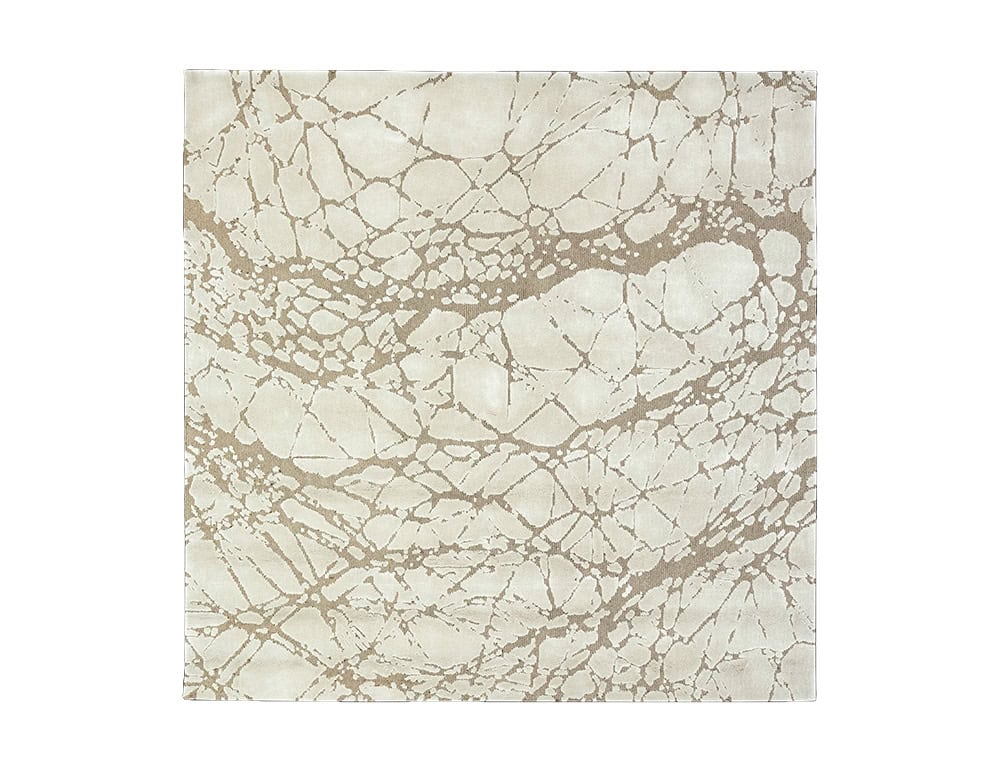 Sah Maze Rug features soft ivory tones with taupe patterns, creating a refined balance of texture and tone. Its organic lines evoke natural stone, perfect for elegant and modern interiors.