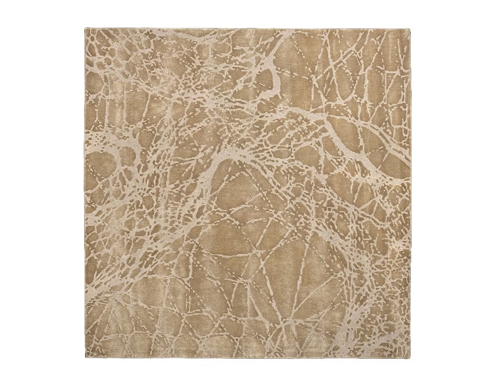Sah Maze Rug presents an earthy beige tone with intricate vein-like patterns that resemble natural stone. Its subtle design blends elegance and organic beauty, perfect for refined living spaces.