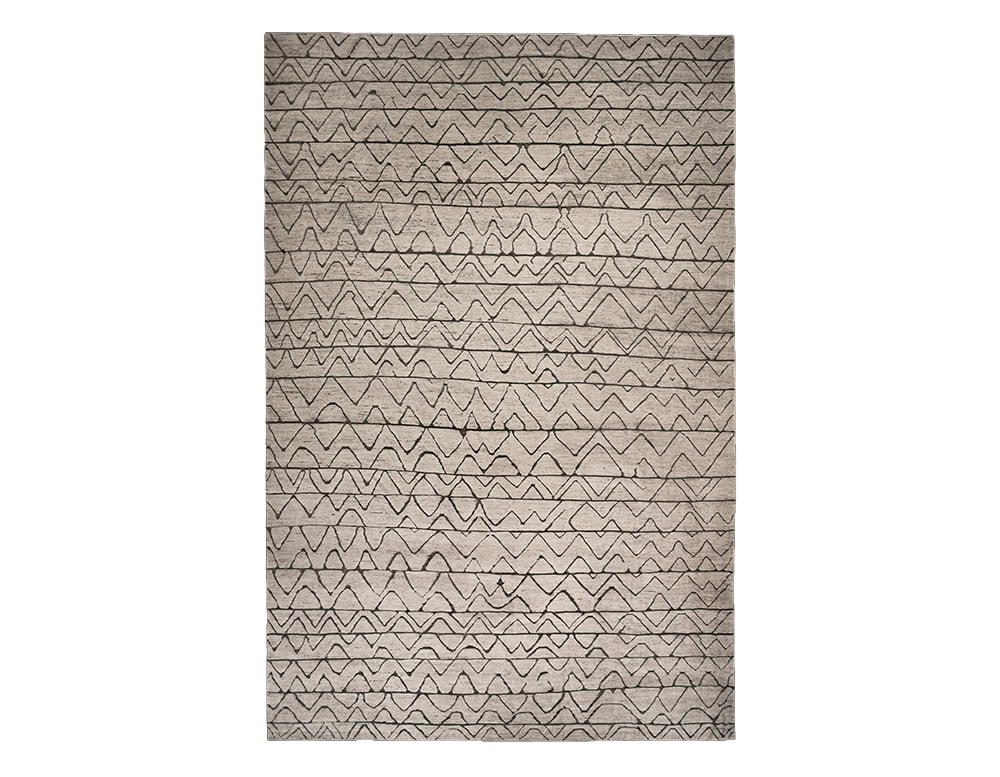 Sah Taza Rug features hand drawn wave like patterns flowing across a soft neutral field. Its artisanal design and earthy palette bring subtle rhythm and texture, making it an elegant addition to modern or rustic spaces.